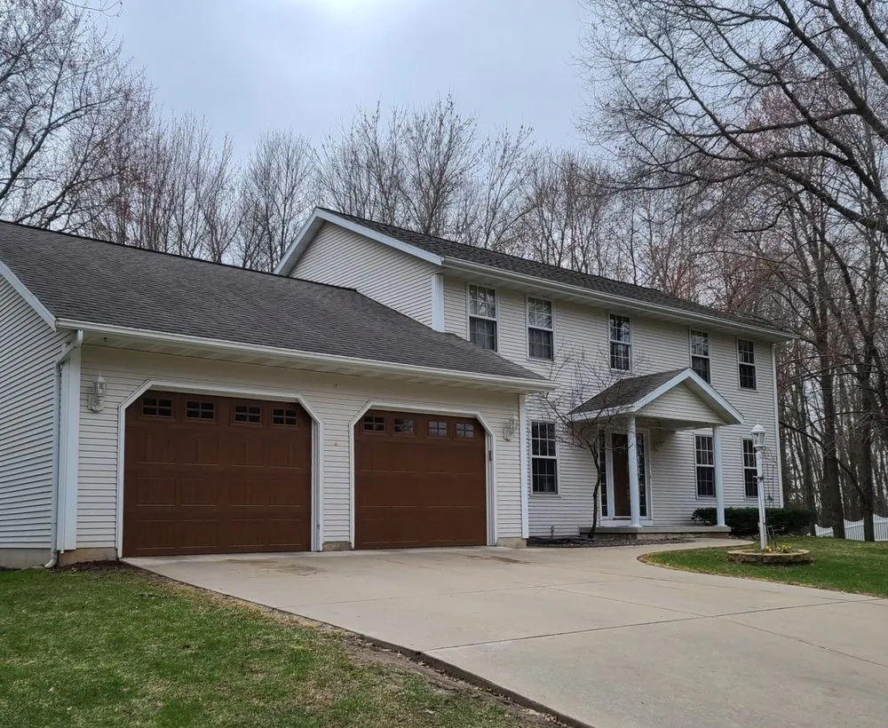 Slide of Comstock Seamless Rain Gutters