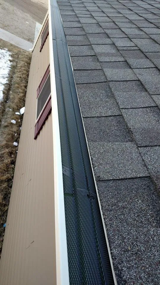 Slide of Comstock Seamless Rain Gutters
