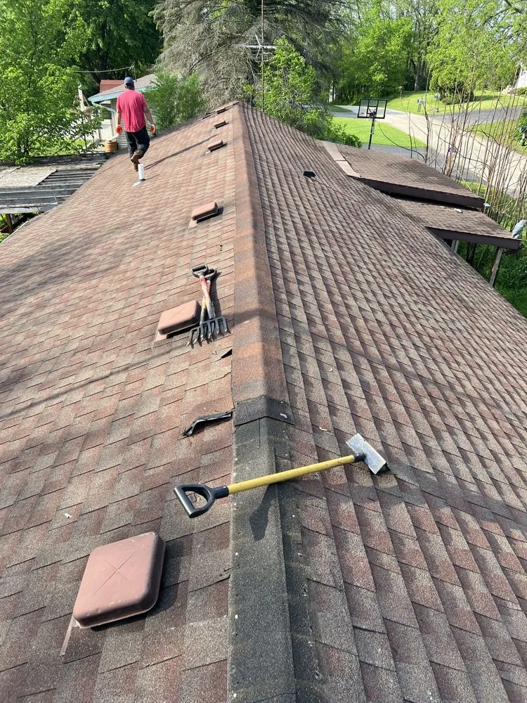 Slide of Conan Roofing