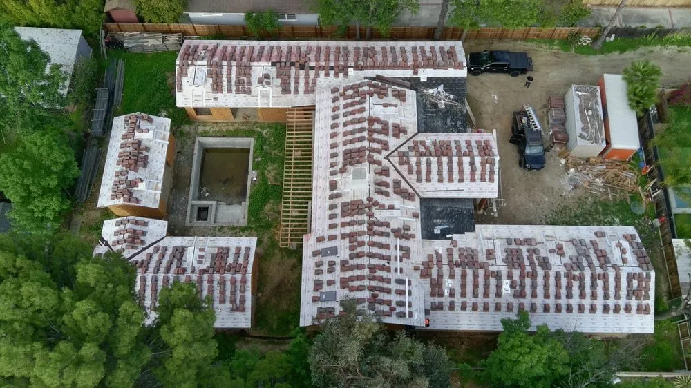 Slide of Confirmed Roofing Experts