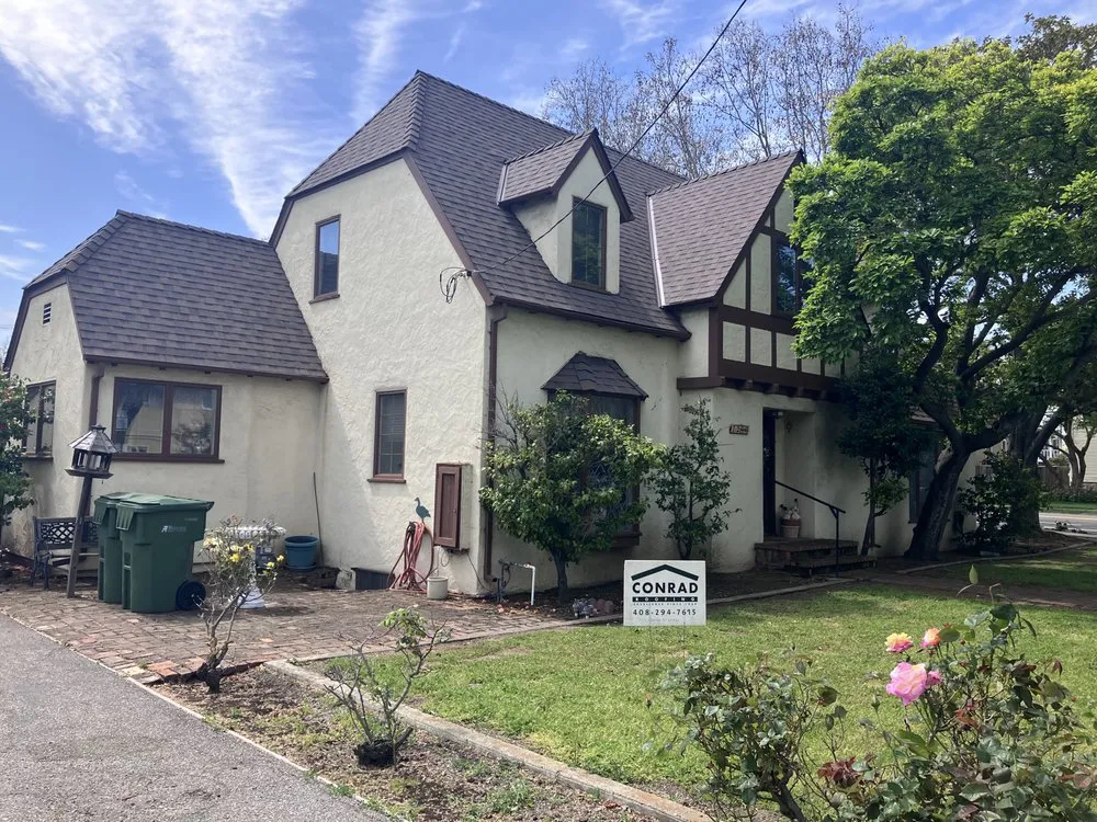 Slide of Conrad Roofing Service