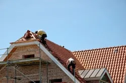 Slide of Conroe Roof Repair
