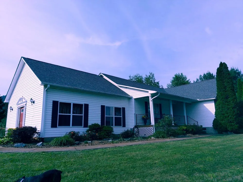 Professional shingle roofing service for homes in Leicester, NC by Consolidated Roofing Contractors
