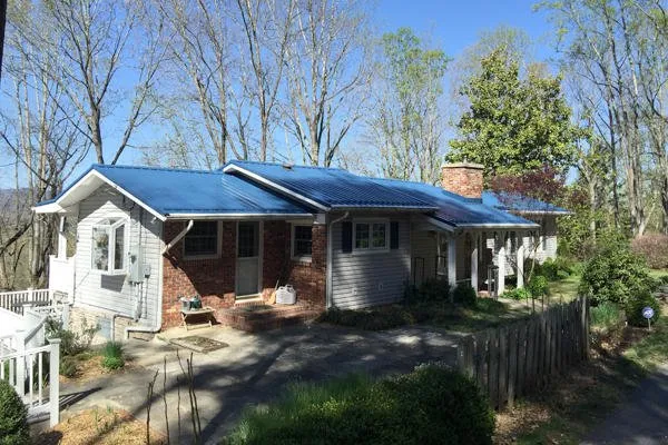 Emergency metal roofing installation in Leicester, NC by Consolidated Roofing Contractors