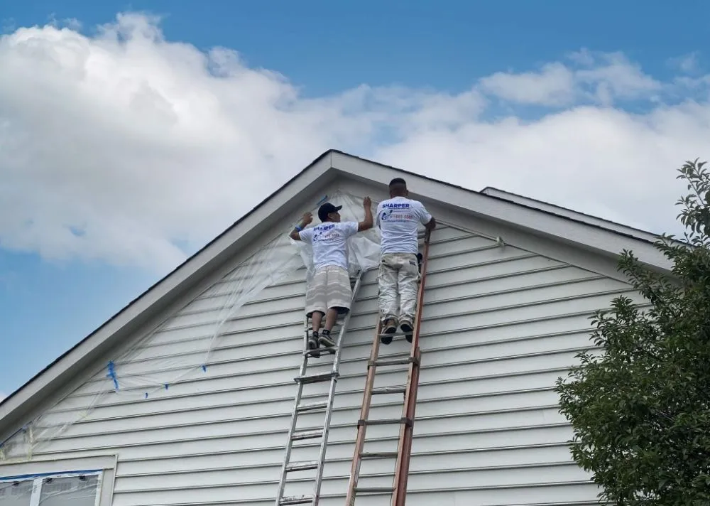 Licensed storm damage roof repair after storm damage in Lilburn, GA by Construct Edge Solutions