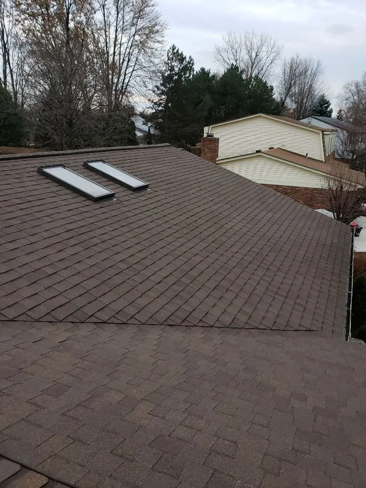 Emergency storm damage roof repair same-day service in Macomb Township, MI by Construction Brothers