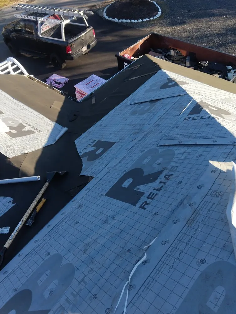 Slide of Construction the Roofing & Siding