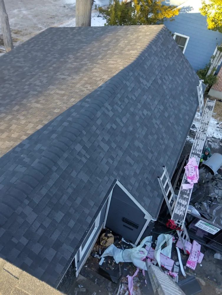 Slide of Construction the Roofing & Siding