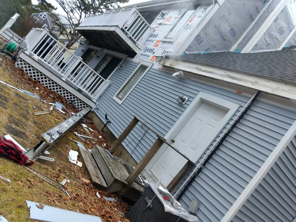 Slide of Construction the Roofing & Siding