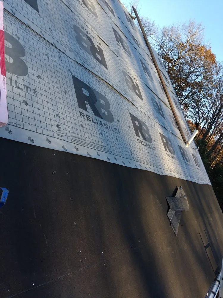 Slide of Construction the Roofing & Siding