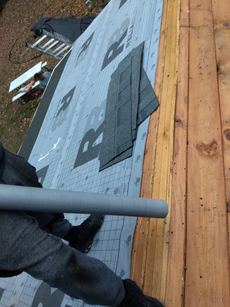 Slide of Construction the Roofing & Siding