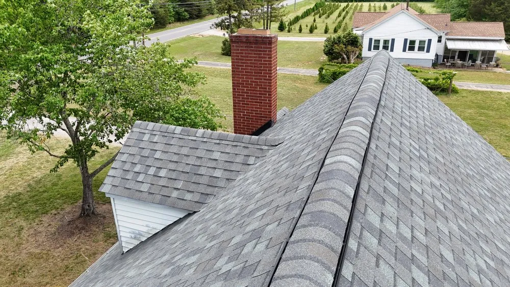 Slide of Contender Roofing