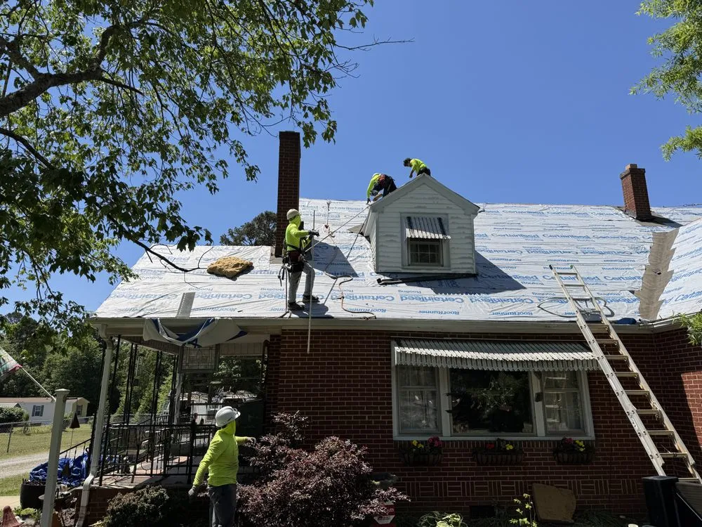 Slide of Contender Roofing