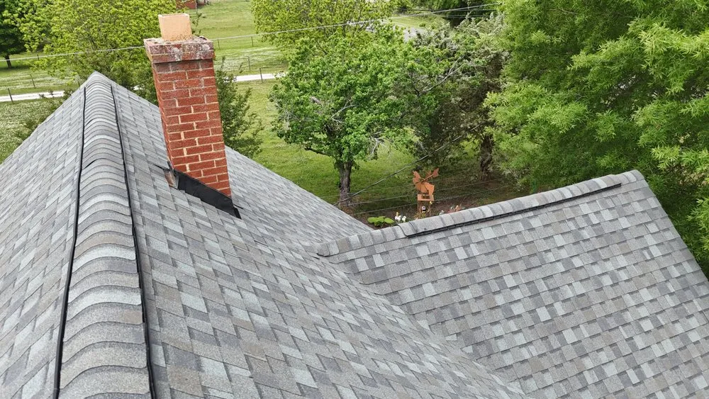 Slide of Contender Roofing