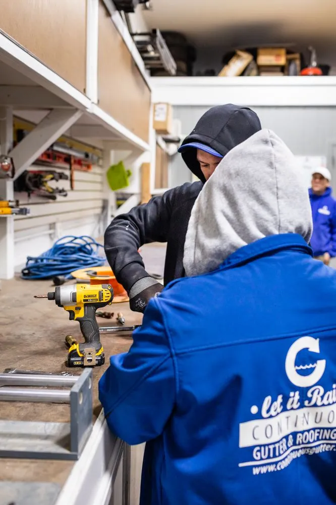 Slide of Continuous Gutter & Roofing