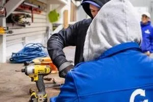 Continuous Gutter & Roofing Logo