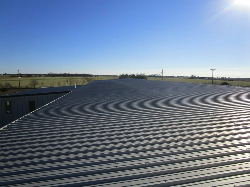 Slide of Cook Roofing