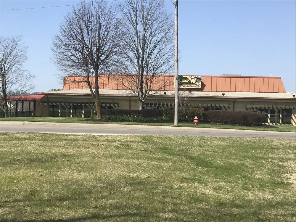 Slide of Cook Roofing