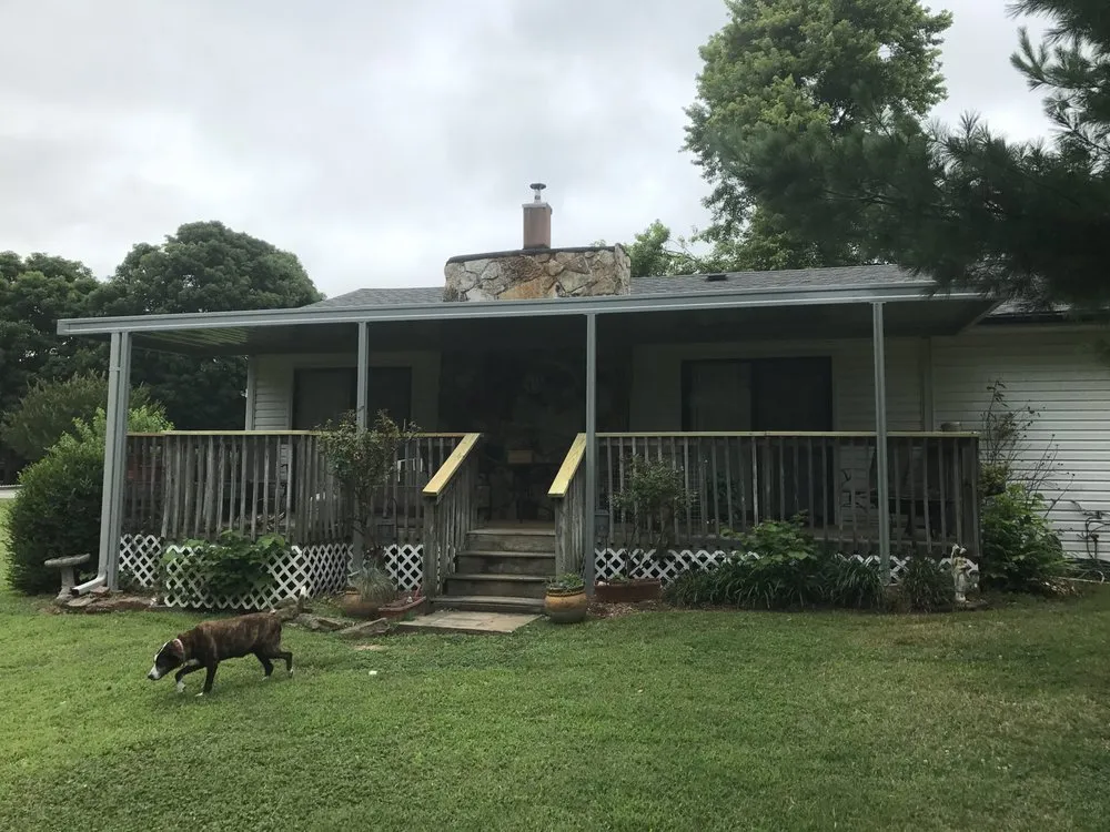 Slide of Cook Roofing