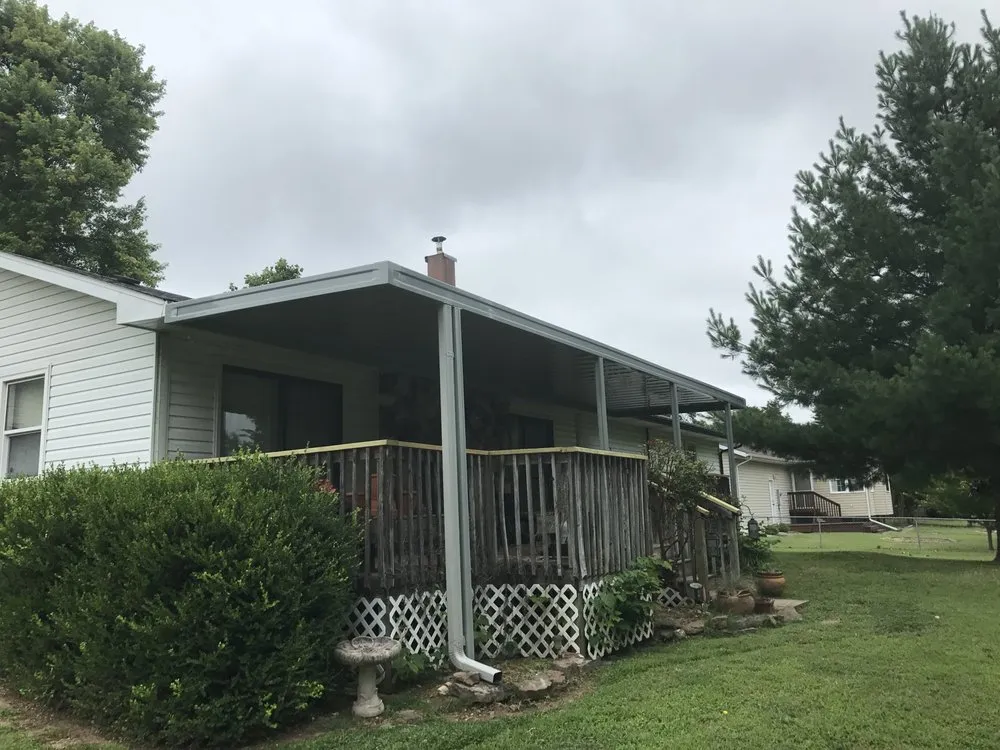 Slide of Cook Roofing