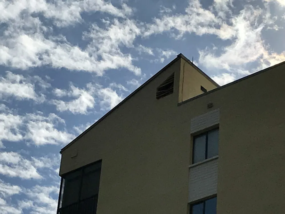 Slide of Cook Roofing