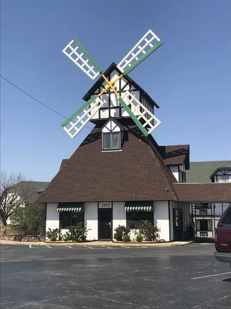 Slide of Cook Roofing