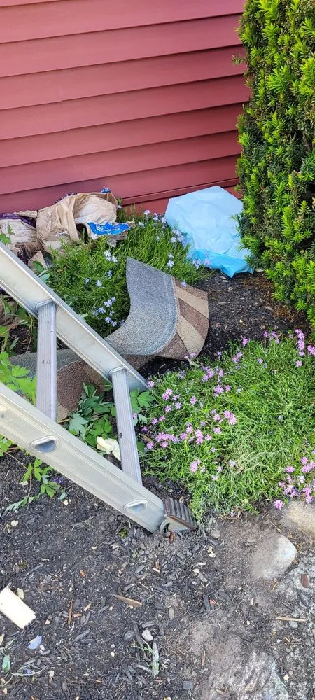 Slide of Cook's Roofing