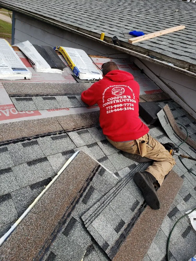 Emergency storm damage roof repair in Newark, IL by Coopers construction