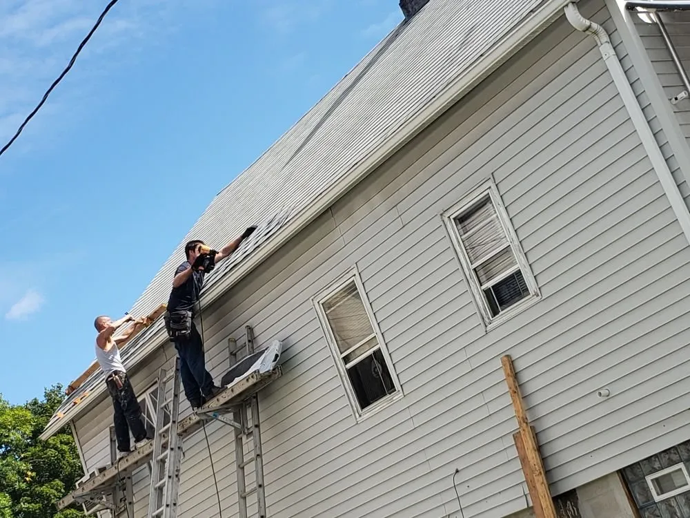 Local roof repair in Newark, IL by Coopers construction