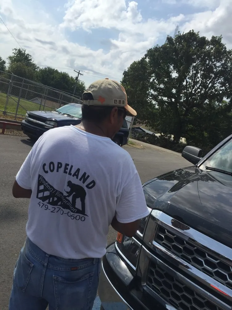 Slide of Copeland Roofing Restoration