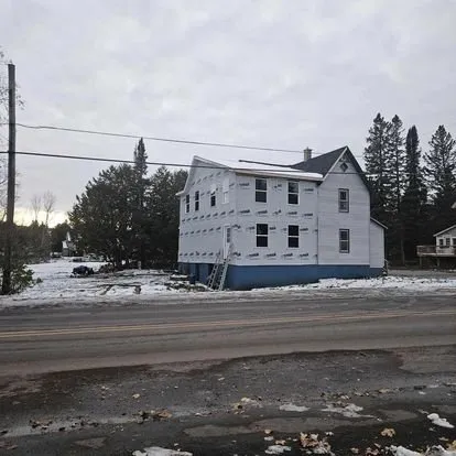 Emergency residential roofing service after storm damage in Calumet, MI by Copper Country Carpentry
