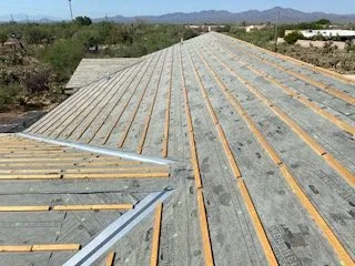 Slide of Copper Ridge Roofing