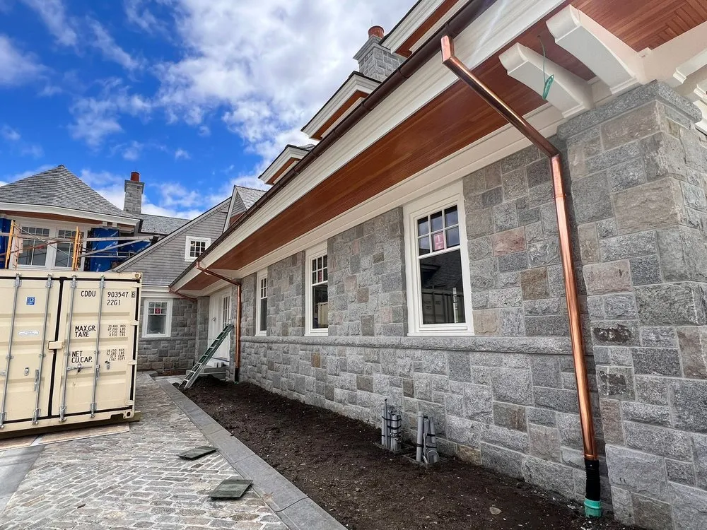 Slide of Copper Slate & Cedar Roofing