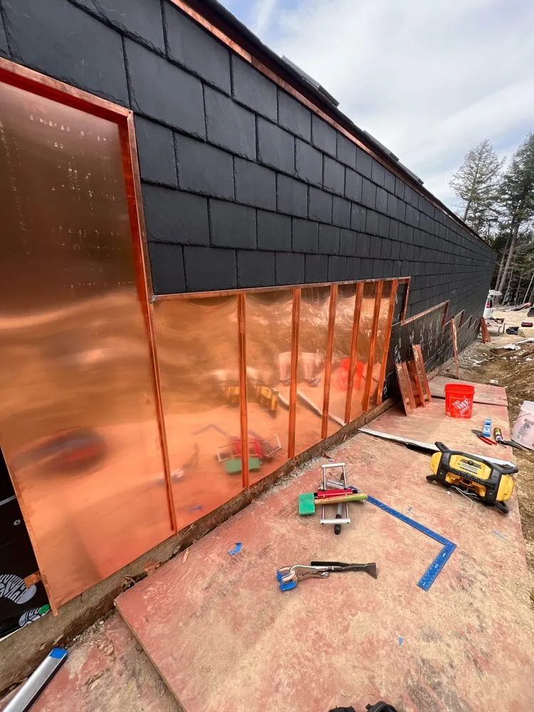 Slide of Copper Slate & Cedar Roofing