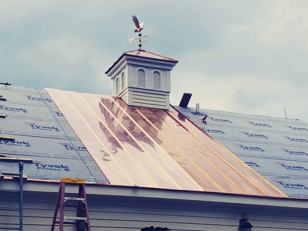 Slide of Copper Slate & Cedar Roofing