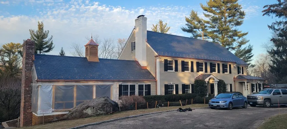 Slide of Copper Slate & Cedar Roofing