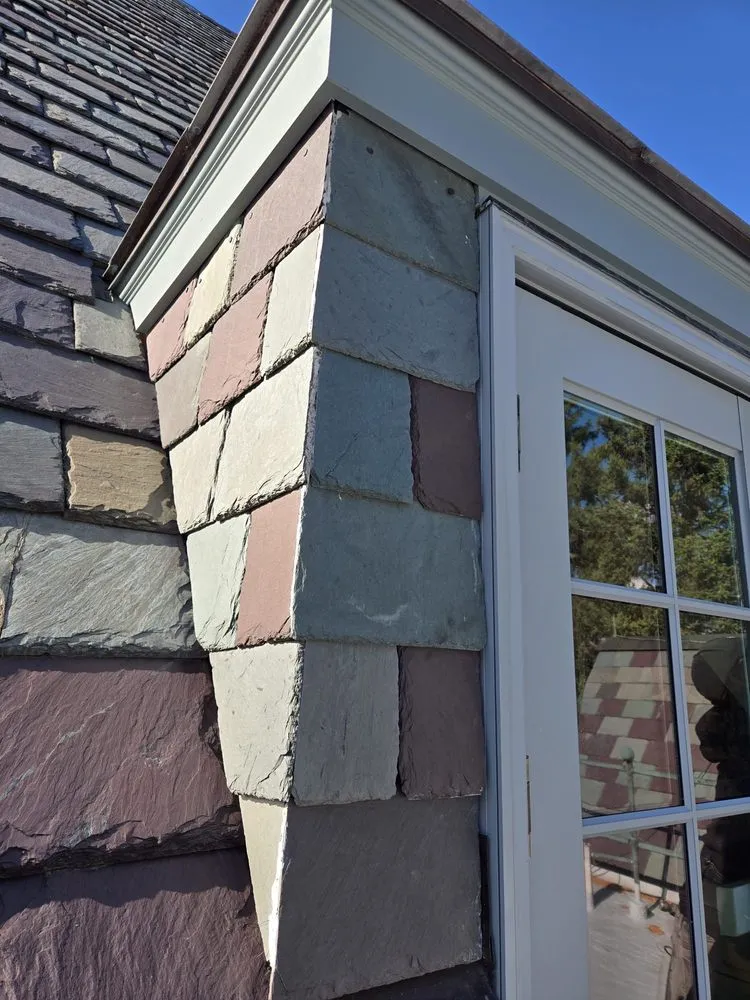 Slide of Copper Slate & Cedar Roofing