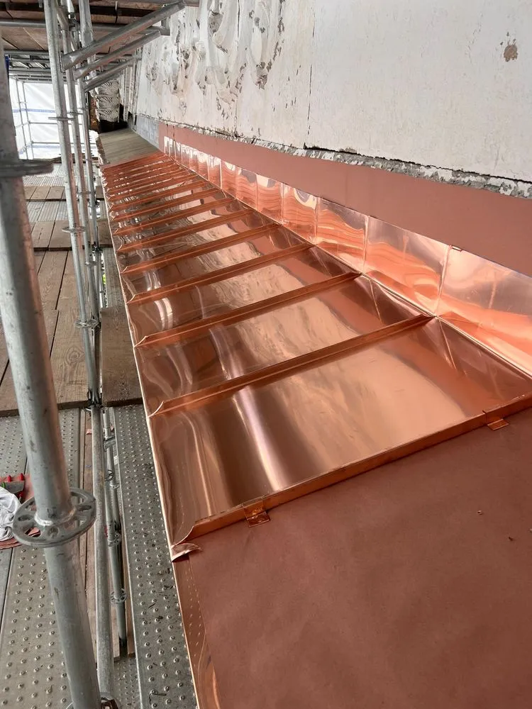 Slide of Copper Slate & Cedar Roofing