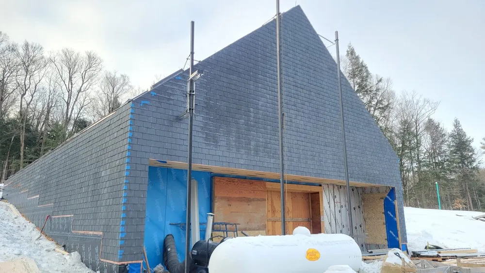 Slide of Copper Slate & Cedar Roofing