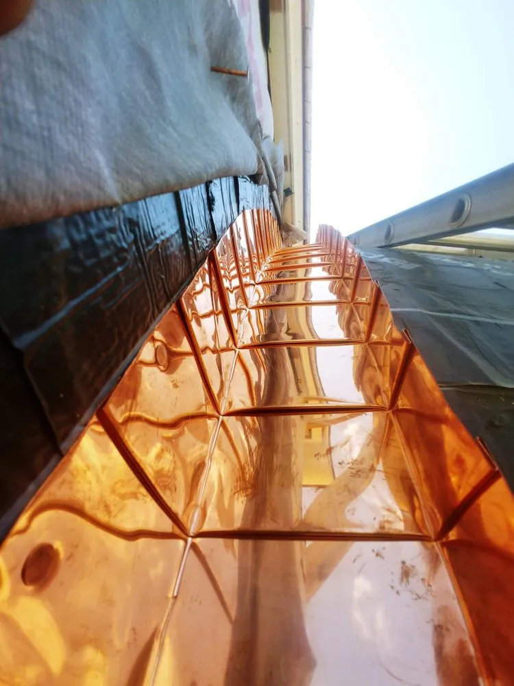 Slide of Copper Slate & Cedar Roofing