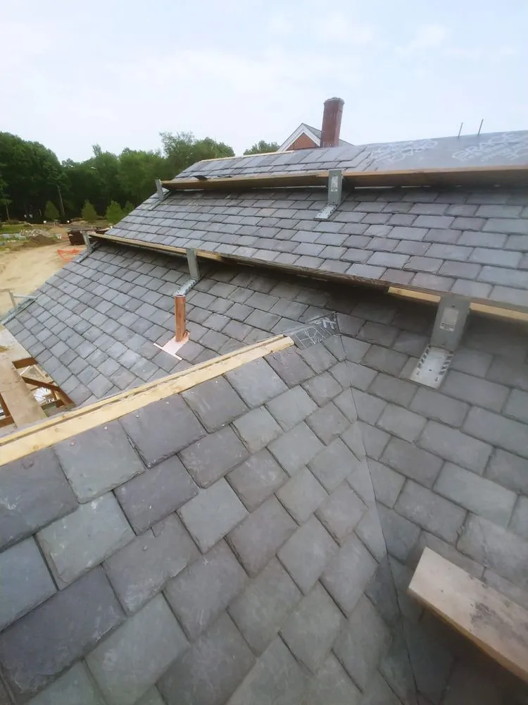 Slide of Copper Slate & Cedar Roofing