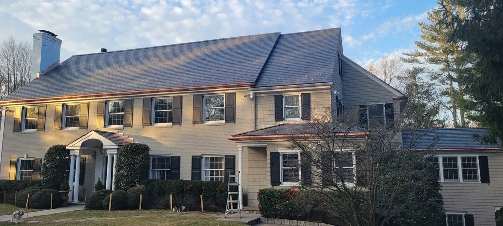 Slide of Copper Slate & Cedar Roofing