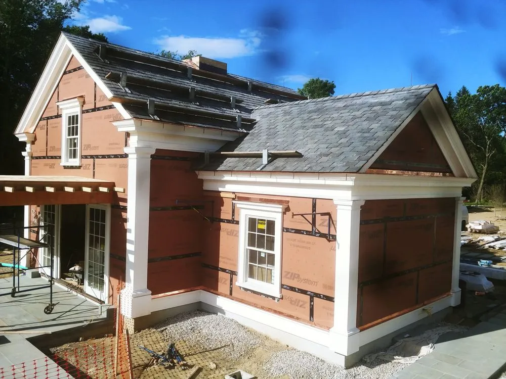 Slide of Copper Slate & Cedar Roofing