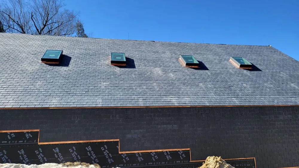 Slide of Copper Slate & Cedar Roofing