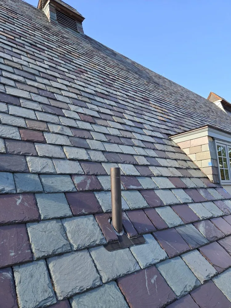 Slide of Copper Slate & Cedar Roofing