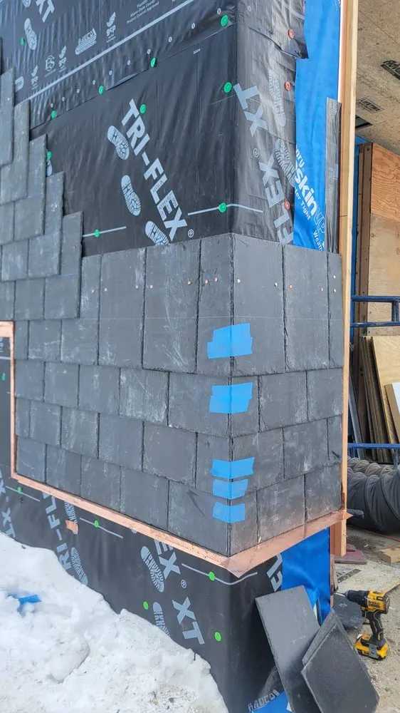 Slide of Copper Slate & Cedar Roofing