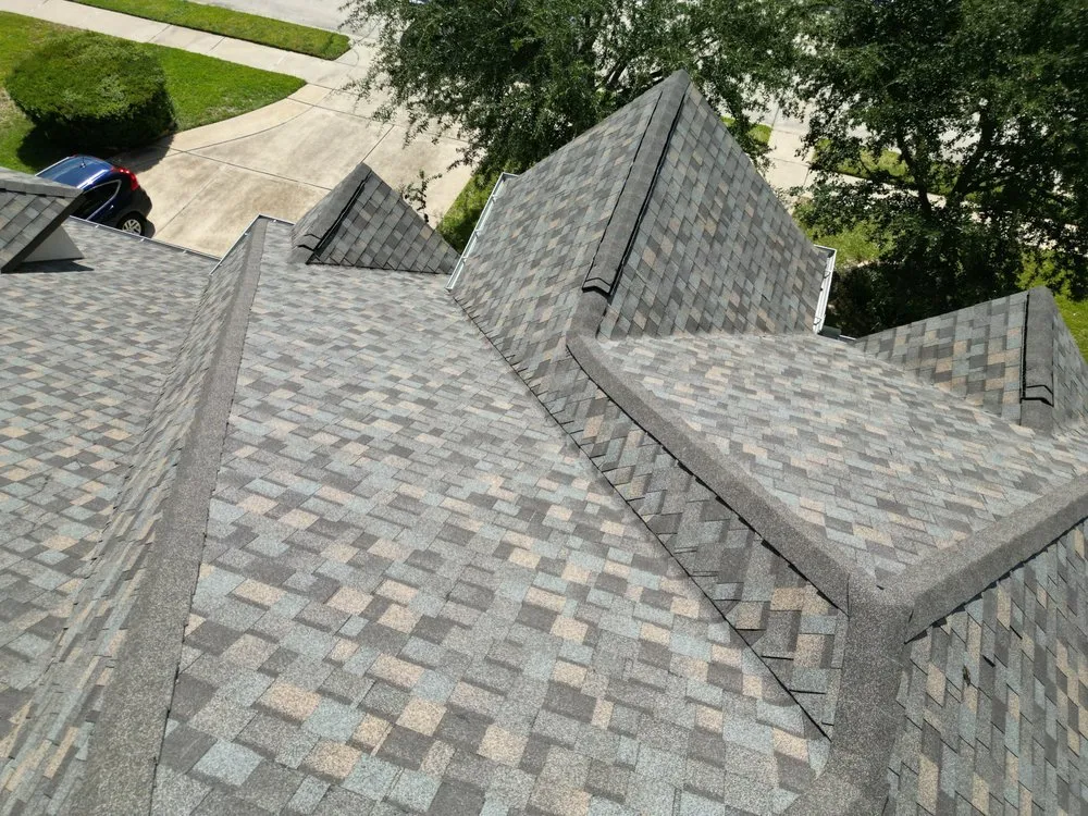 Slide of Core Four Roofing