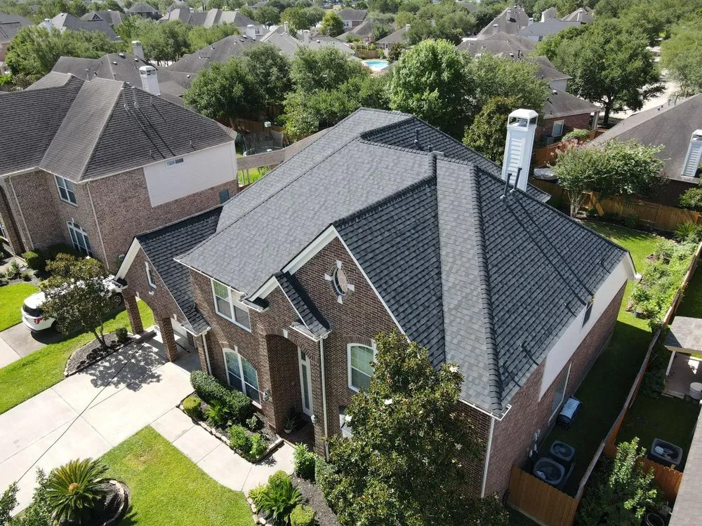 Slide of Core Four Roofing