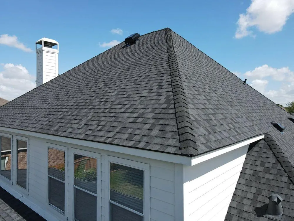 Slide of Core Four Roofing