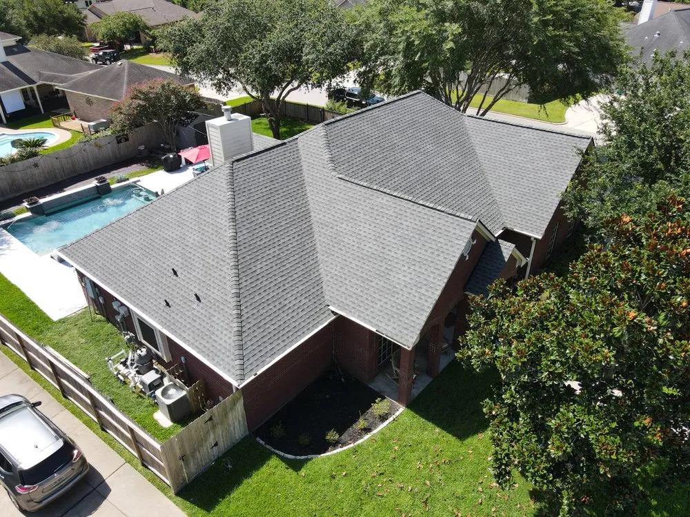 Slide of Core Four Roofing